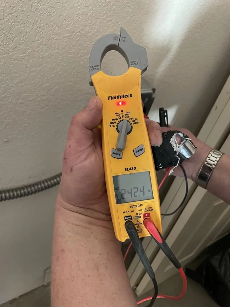 Voltage testing with clamp meter during Circuit Breaker Repair in Newfield